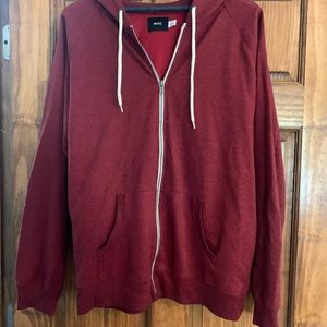 Burgundy men’s zipper hoodie.